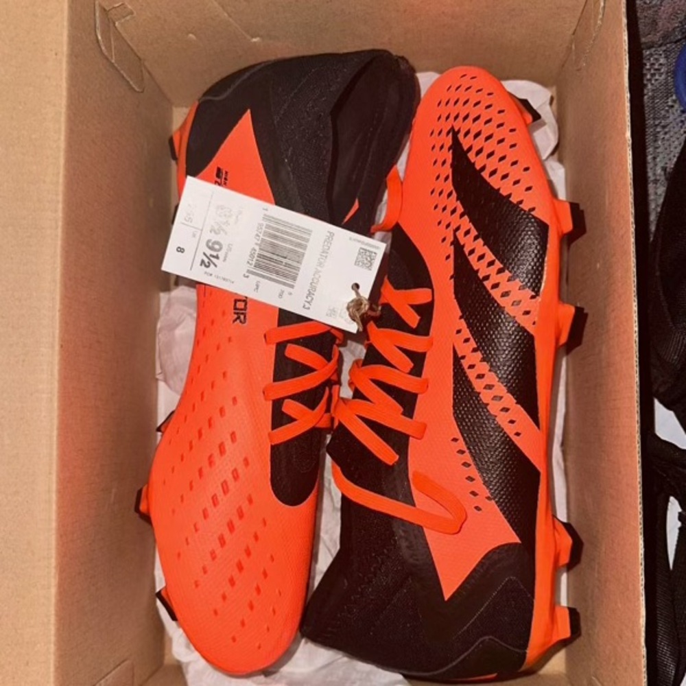 Brand New with tags low firm ground soccer cleats